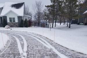 Removal of snow from home roofs.